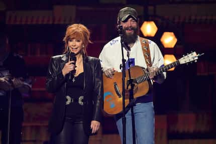 Reba McEntire, left, and Post Malone perform "Ramblin' Man" during the 59th annual Academy...