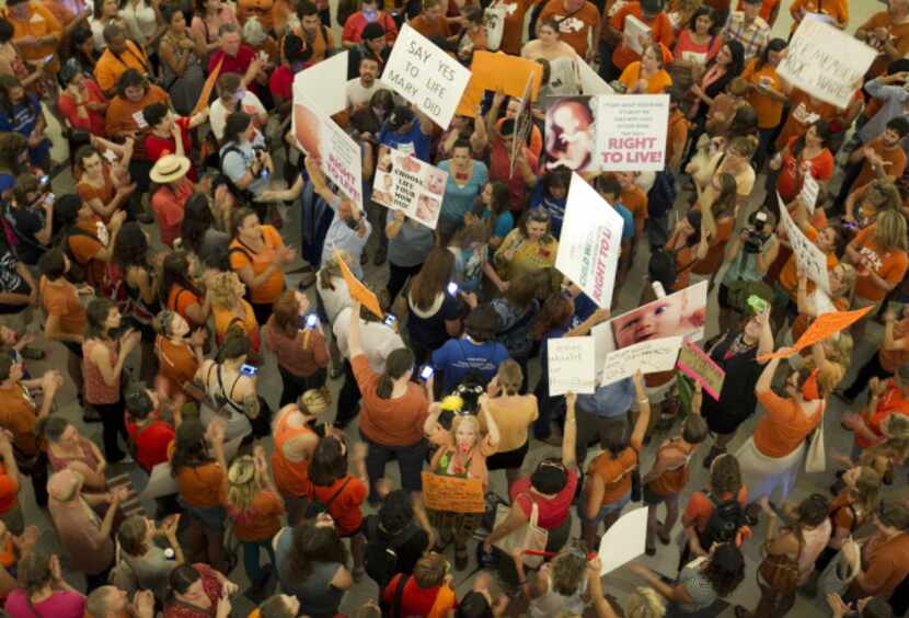 People on both sides of the abortion debate gathered Friday during the Senate's debate at...
