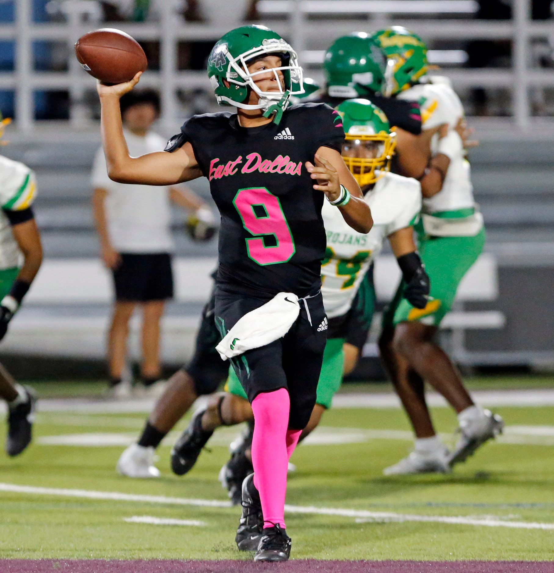 Bryan Adams High QB Isaiah Del Rio (9) throws a pass during the first half of a high school...