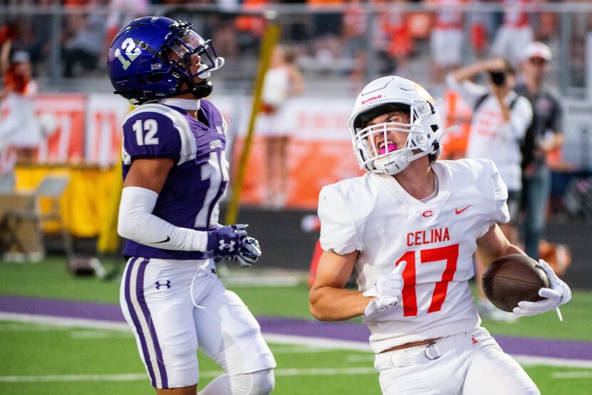 Celina Ryan Mikesch (17) celebrates a touchdown in front of Anna cornerback Elijah Robertson...