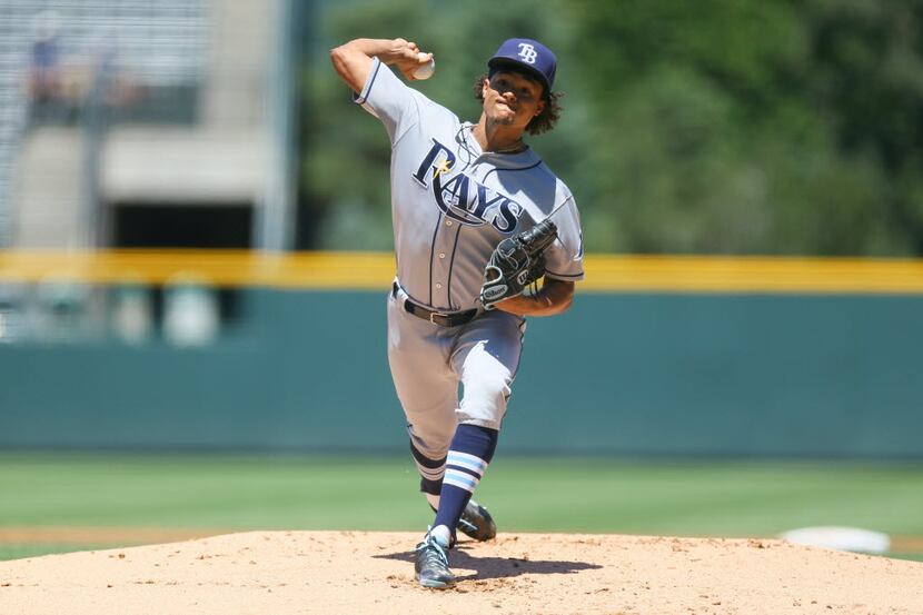 DENVER, CO - JULY 20:  Starting pitcher Chris Archer #22 of the Tampa Bay Rays delivers to...