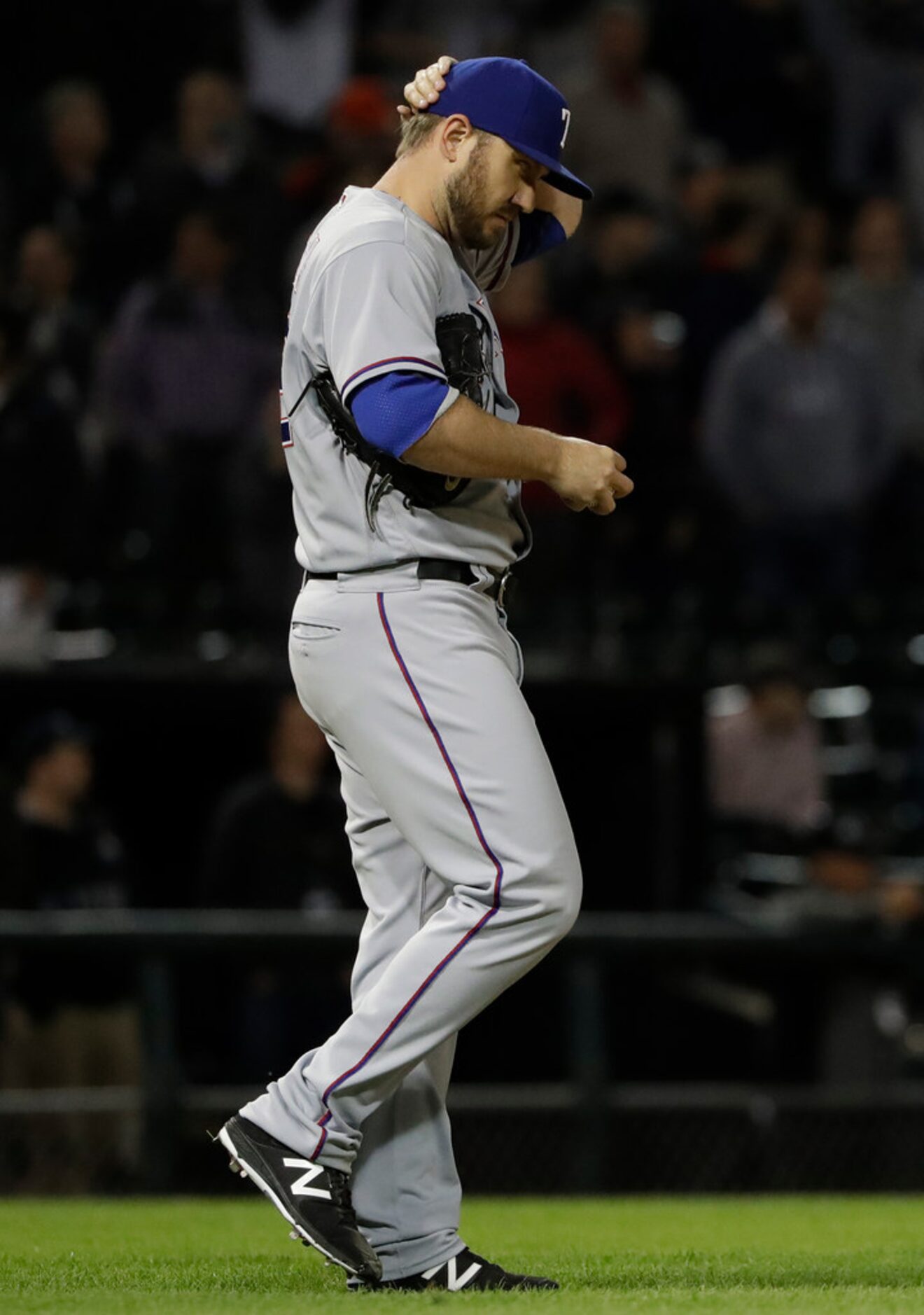 Texas Rangers relief pitcher Kevin Jepsen reacts after Chicago White Sox's Welington...