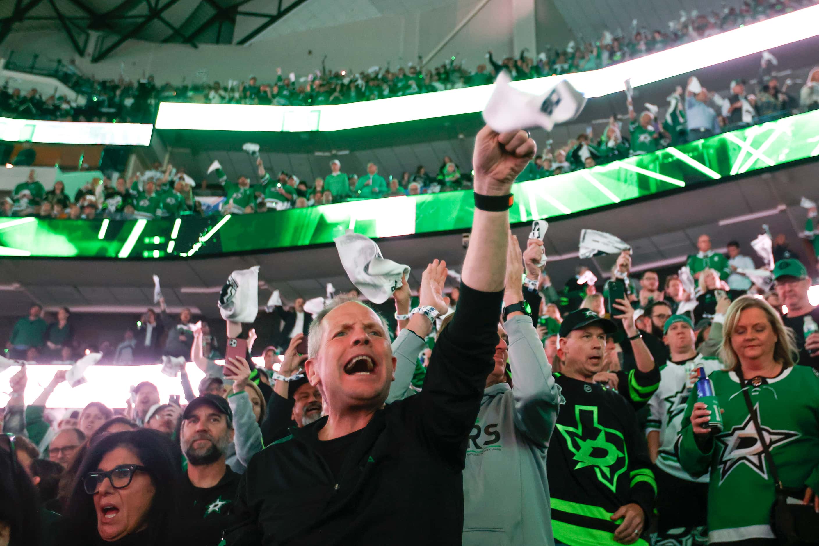 Dallas Stars fans cheer ahead of Game 2 of an NHL hockey Stanley Cup second-round playoff...
