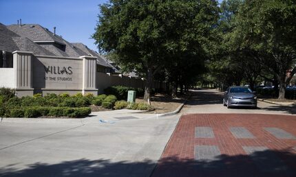 A car passes the Villas at the Studios neighborhood at the corner of Creative Way and Studio...