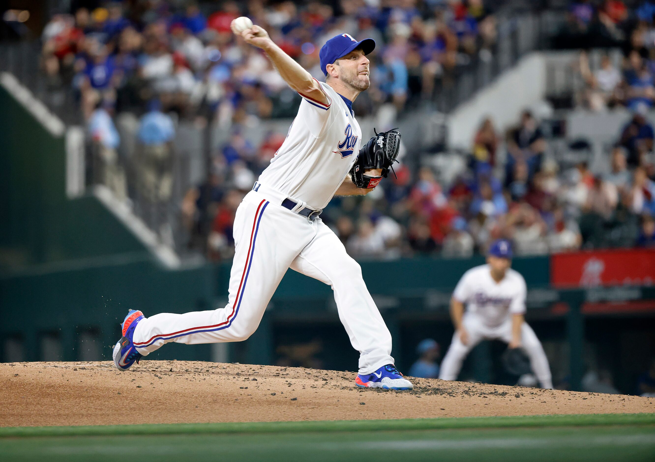 Texas Rangers starting pitcher Max Scherzer (31) throws against the Chicago White Sox during...