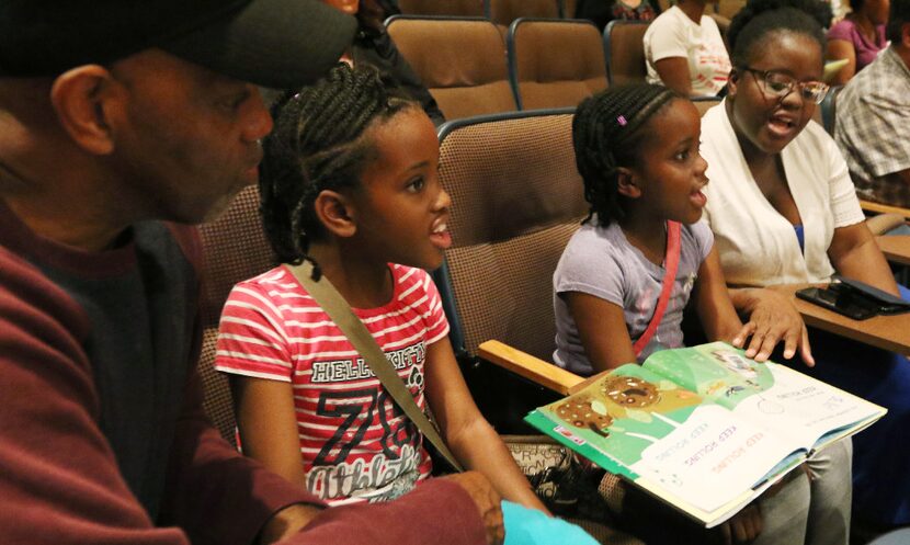 Curtis Major (left), daughters Chelsea, 10, and Indie, 8, and wife Lisa spend a family day...