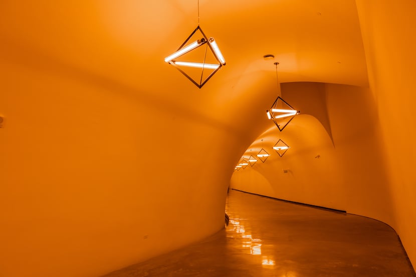 A work by Olafur Eliasson occupies the tunnel linking the Kinder Building to its parking...