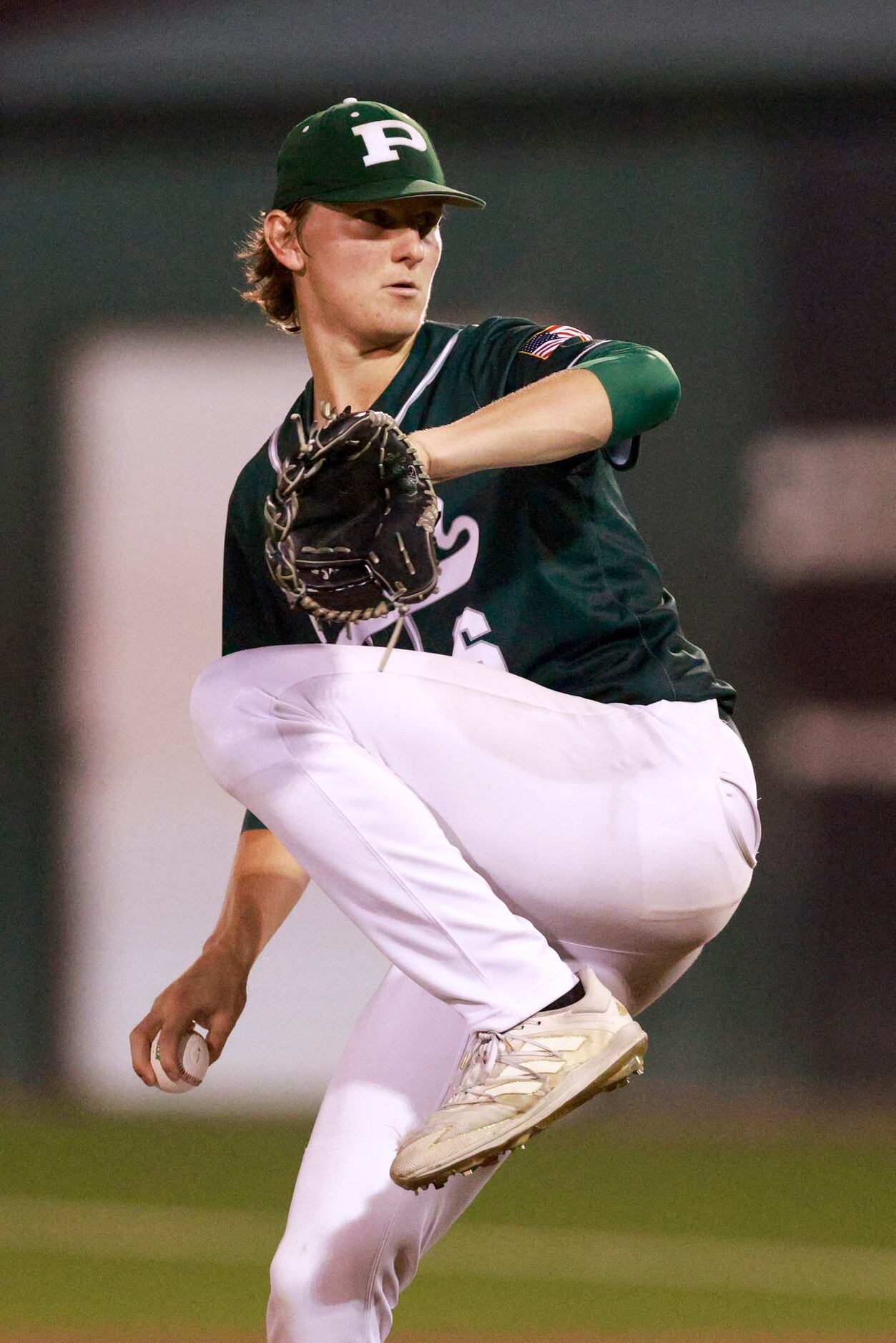 Prosper starting pitcher Lucas Davenport (6) delivers a pitch against Coppell during game...