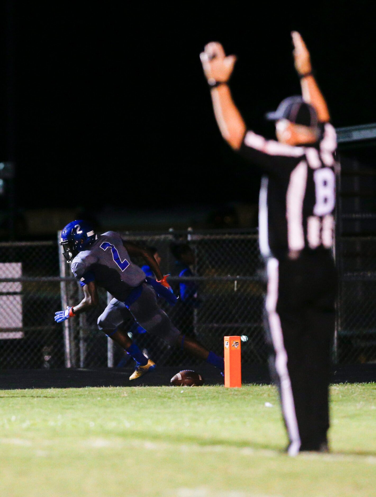 TXHSFB North Mesquite senior wide receiver Torrion Smith (2) celebrates scoring a touchdown...