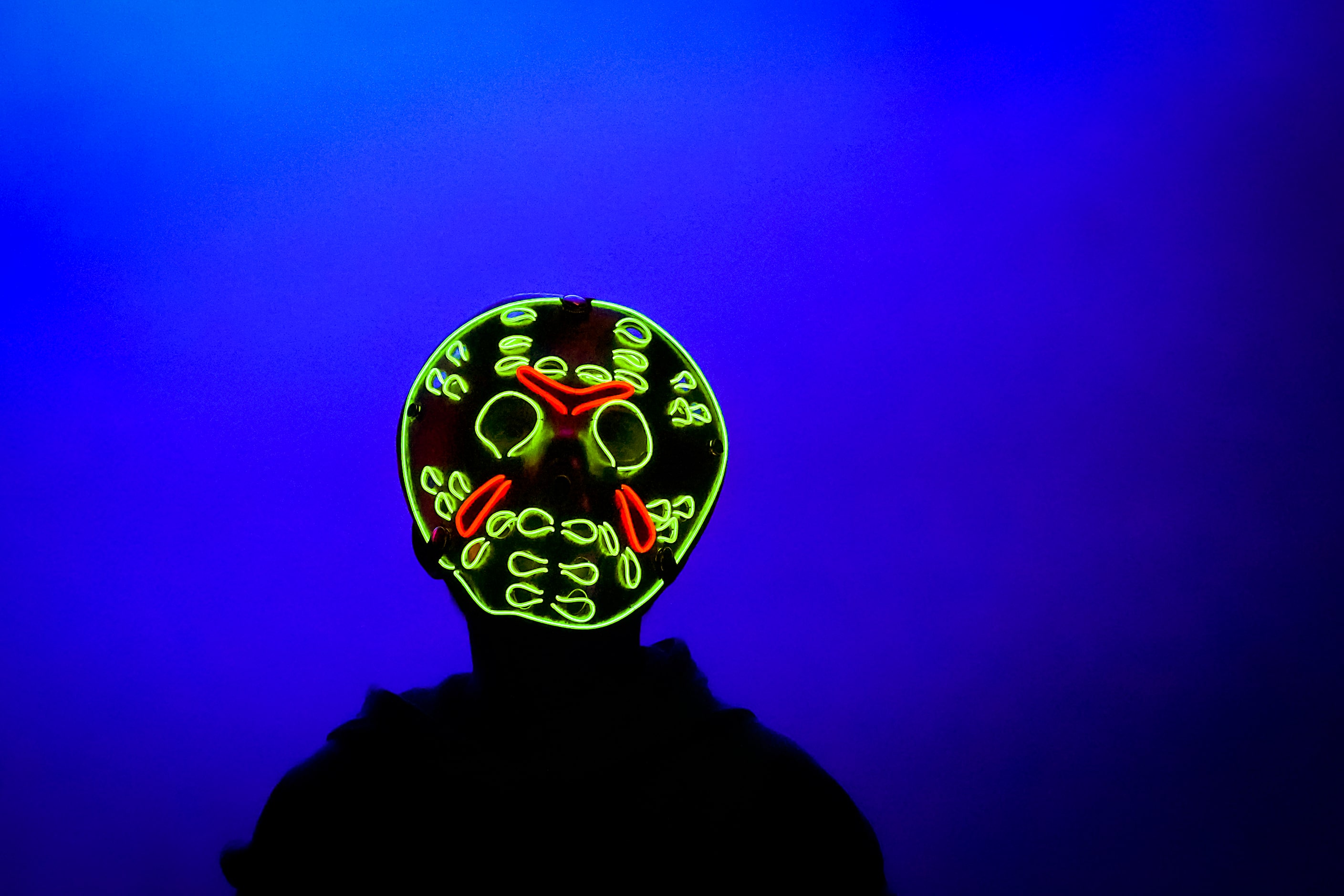 A youngster wears a lighted mask on opening day at the State Fair of Texas on Friday, Sept....