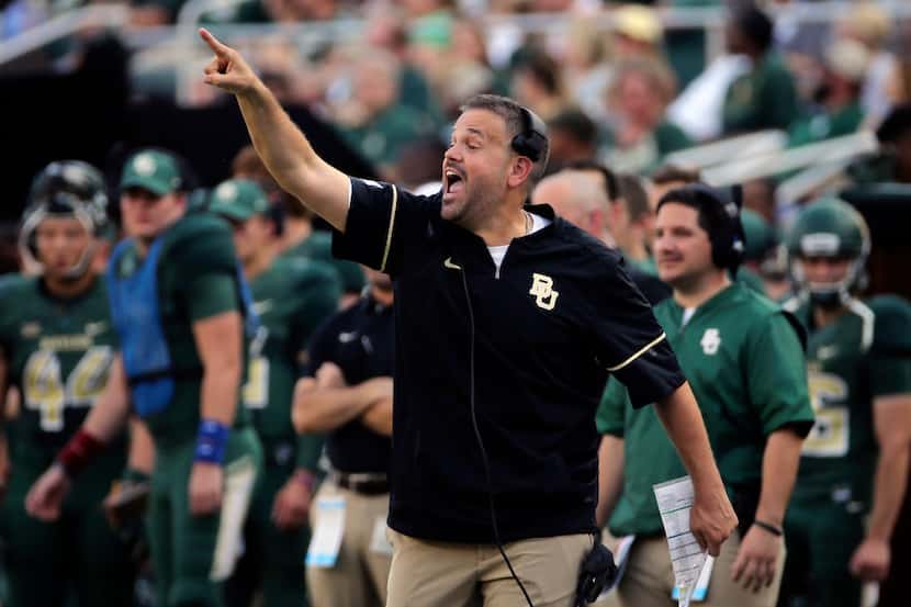 Baylor head coach Matt Rhule calls in a play against Liberty in the first half of an NCAA...
