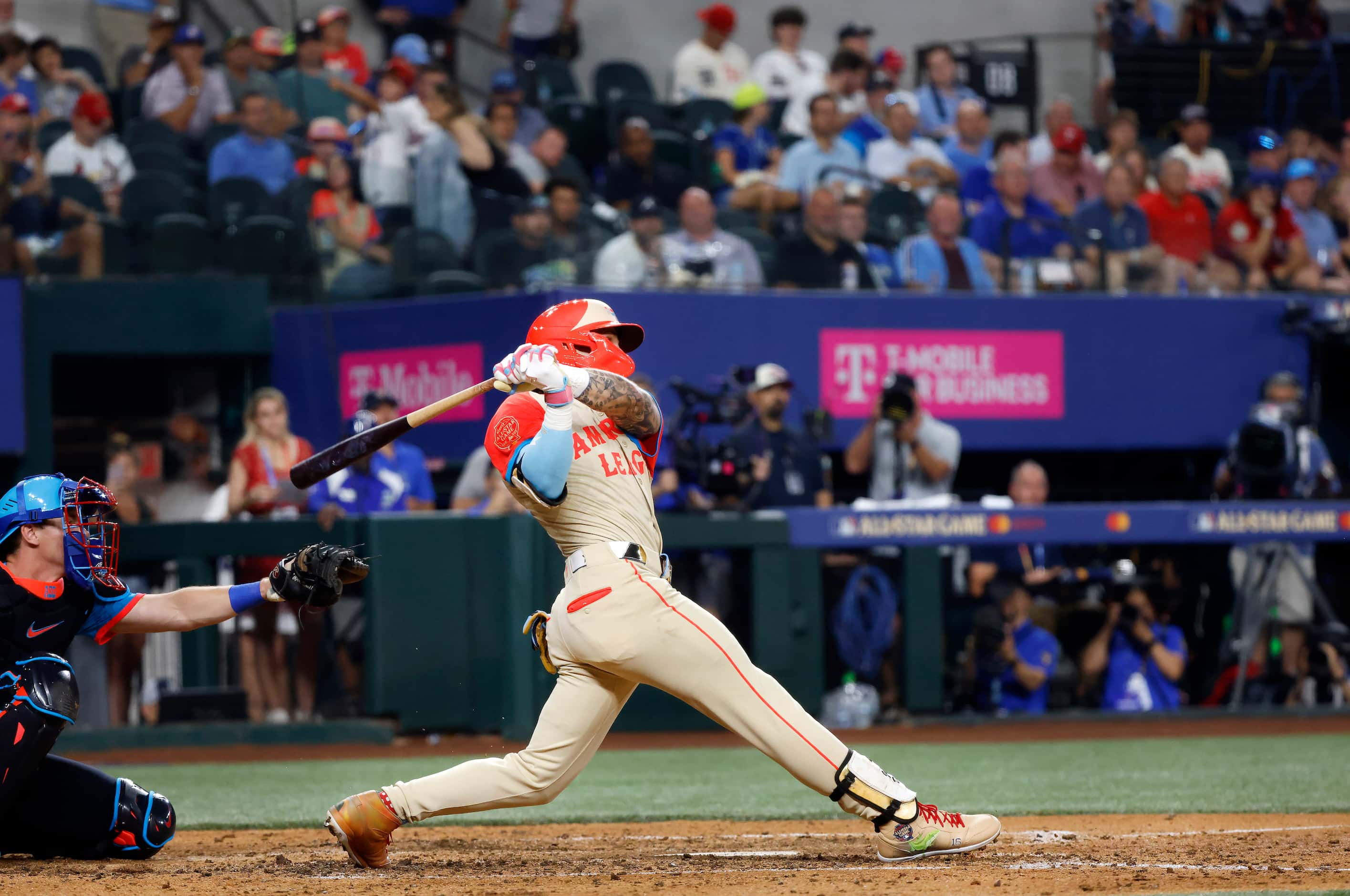 American League's Jarren Duran, of the Boston Red Sox, connects on a two-RBI homer during...