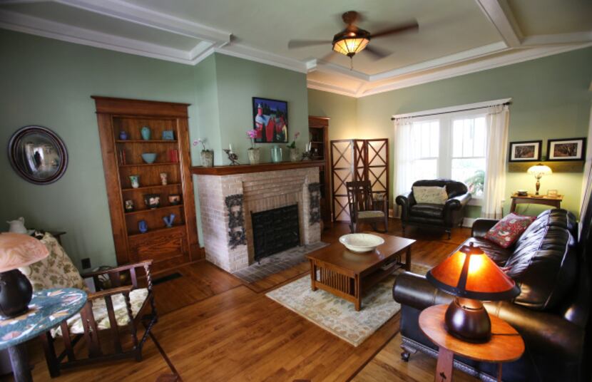 The living room of Jackie and Doug Sweat's home on Junius Street in Munger Place  on...