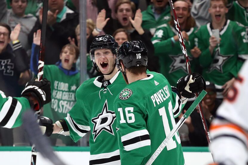 DALLAS, TEXAS - MARCH 03:  John Klingberg #3 of the Dallas Stars celebrates his goal with...