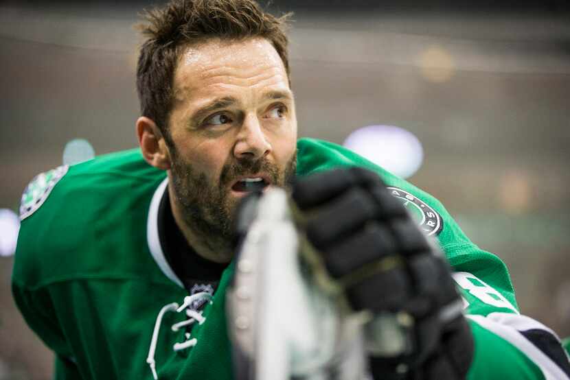 Dallas Stars center Vernon Fiddler stretches during warm ups before an NHL hockey game...