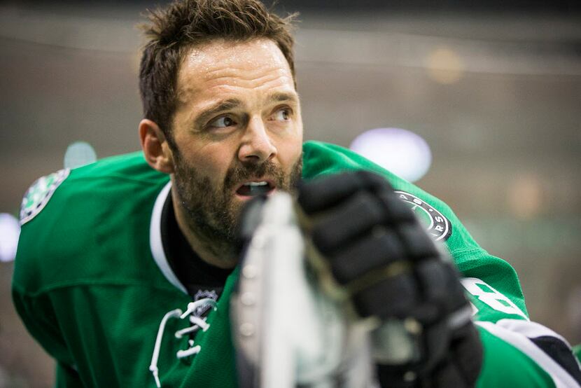 Dallas Stars center Vernon Fiddler stretches during warm ups before an NHL hockey game...