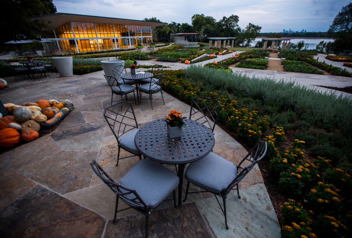 A seating area near the test kitchen building at the new Tasteful Place edible garden at the...