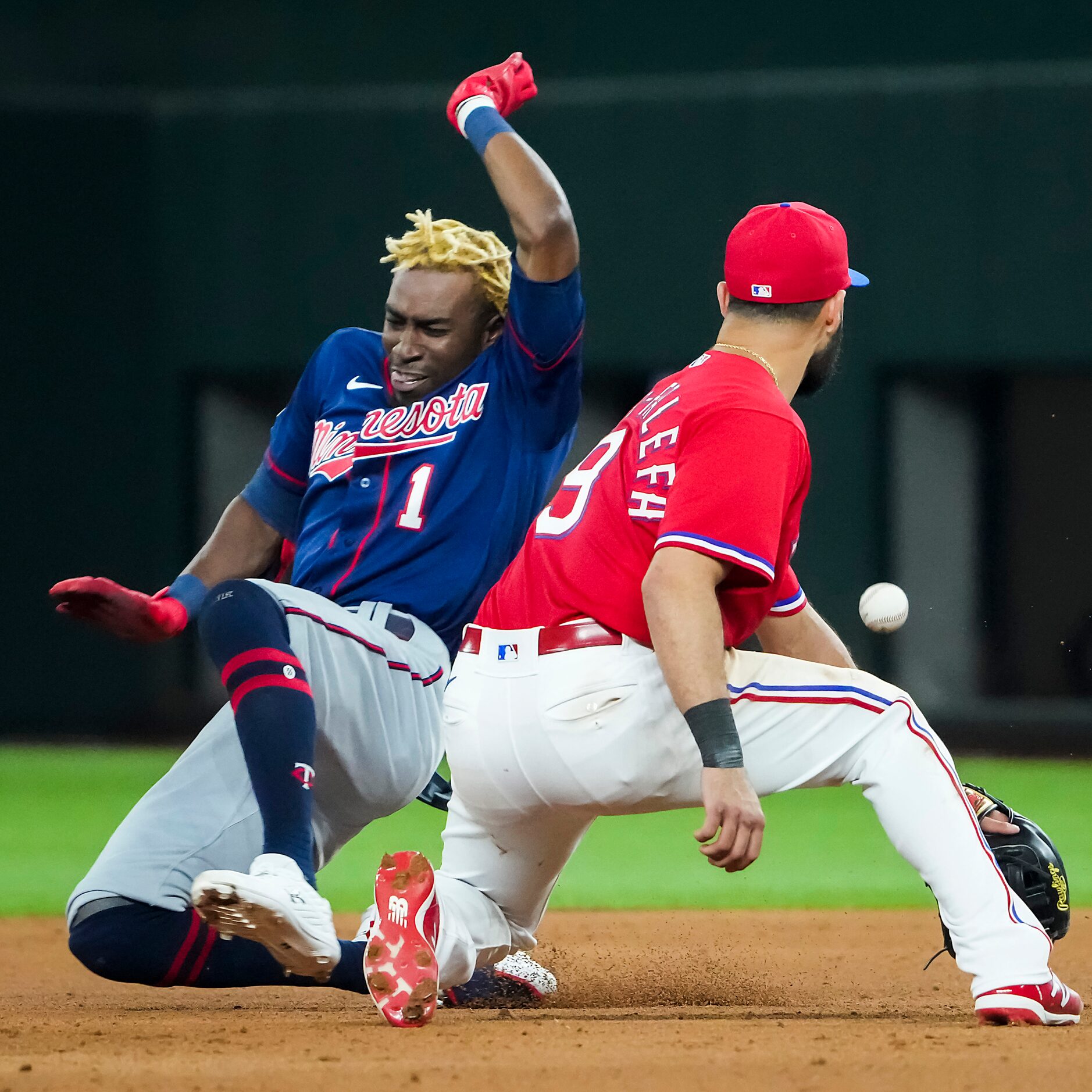 Minnesota Twins center fielder Nick Gordon is safe at second base with a double ahead of the...