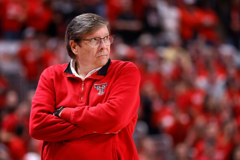 Texas Tech Red Raiders head coach Mark Adams is pictured with his signature arms folded pace...