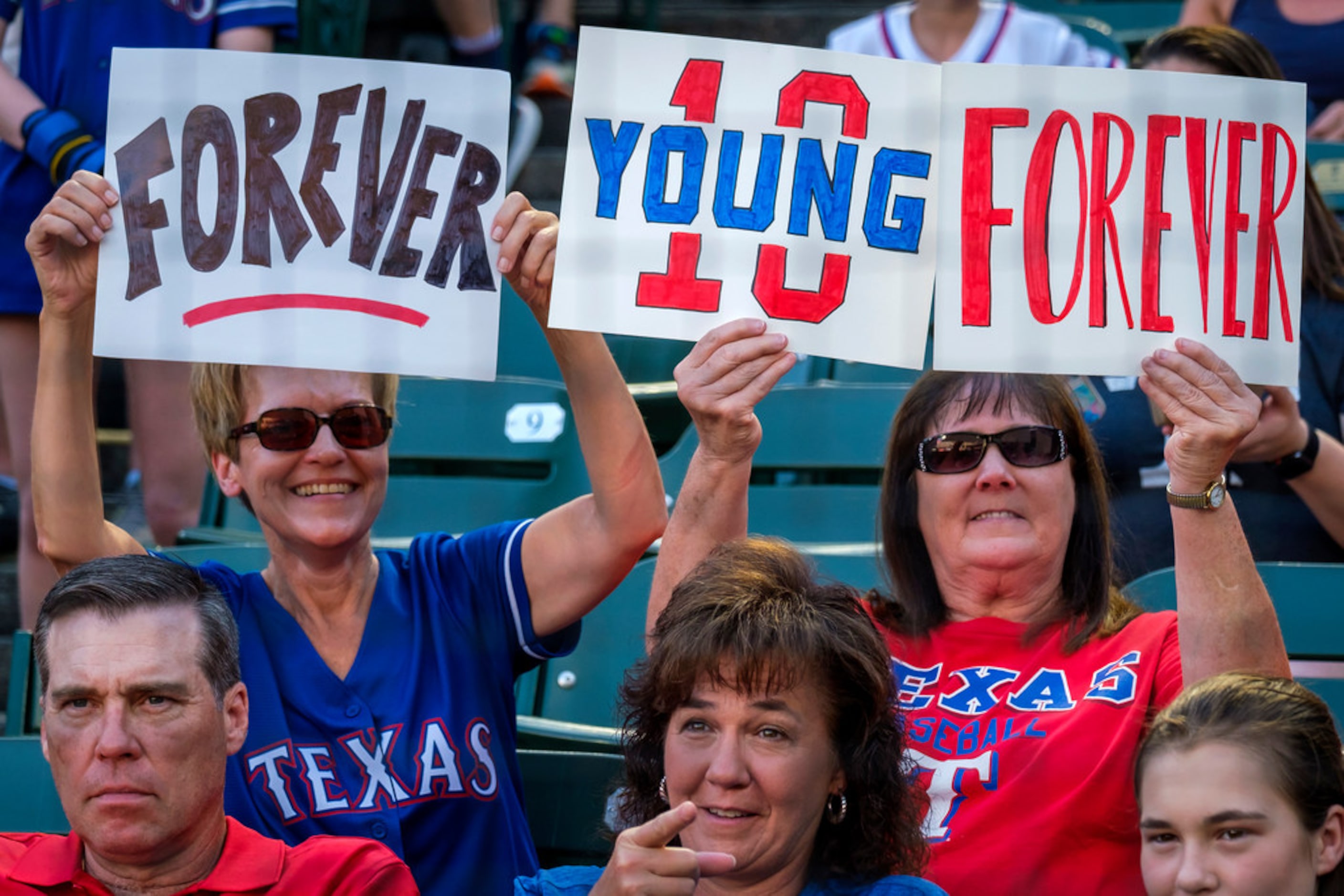 The Texas Rangers retire Michael Young's No. 10 before a game against the Seattle Mariners...