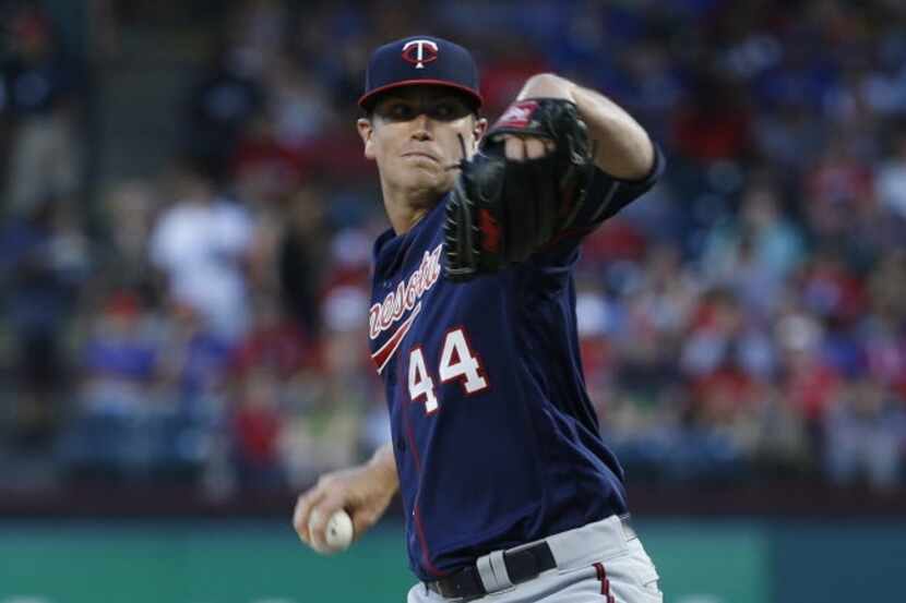 Minnesota Twins starting pitcher Kyle Gibson (44) pitches in the first inning at Globe Life...