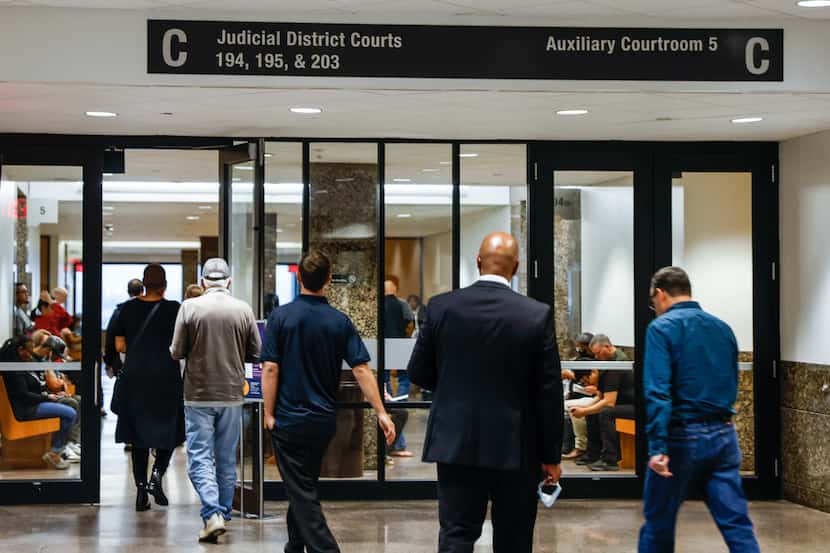 People walked the hallways of the Frank Crowley Courts Building on Monday, Oct. 24, 2022....
