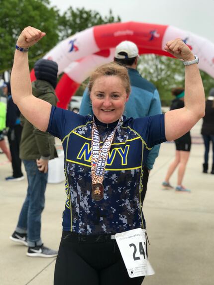 Emily Susan Law, 49, celebrates after a triathlon in April 2018.