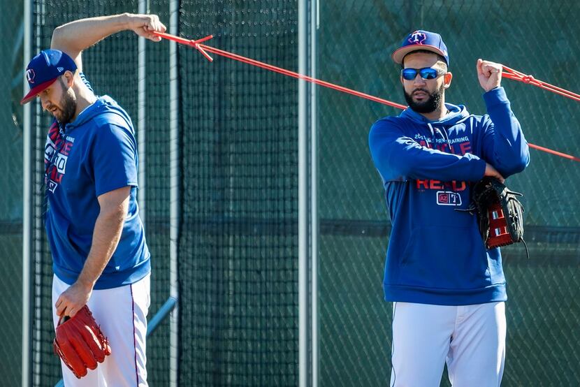 Texas Rangers outfielders Nomar Mazara (right) and Joey Gallo stretch during a spring...