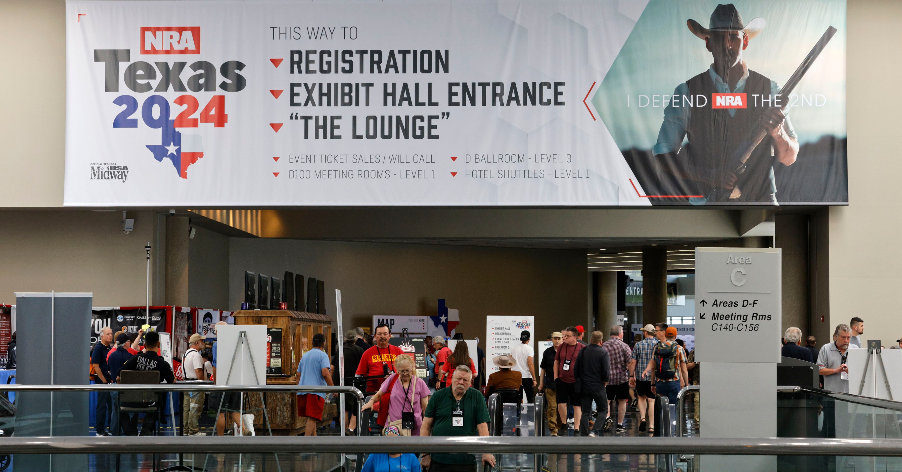 Visitors walk around during 2024 NRA Annual Meetings & Exhibits at Kay Bailey Hutchison...