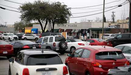 A parking lot at the intersection of Snider Plaza and Daniel Avenue at Snider Plaza in...