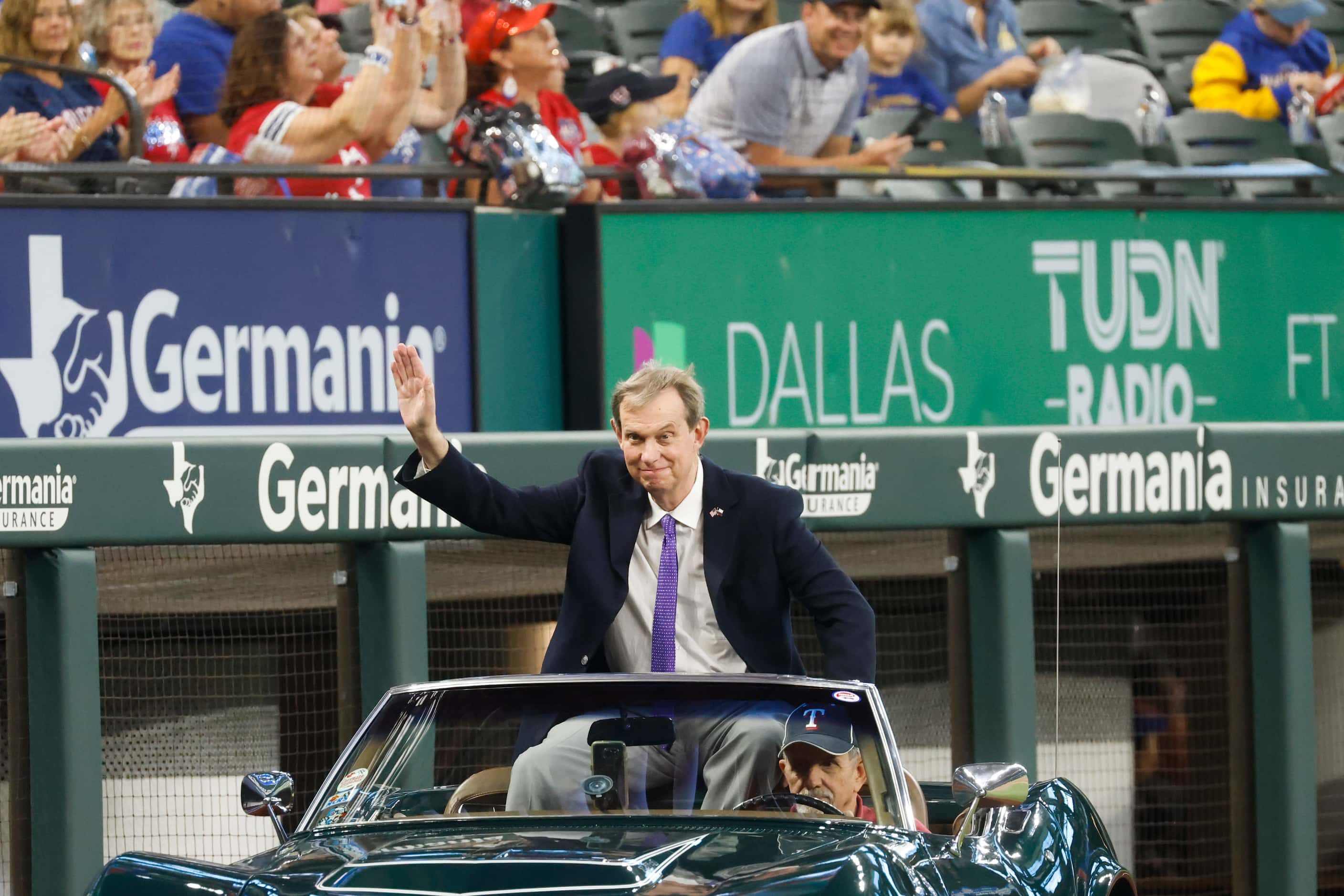 Texas Rangers media VP John Blake waves as he arrives at the induction ceremony at Globe...