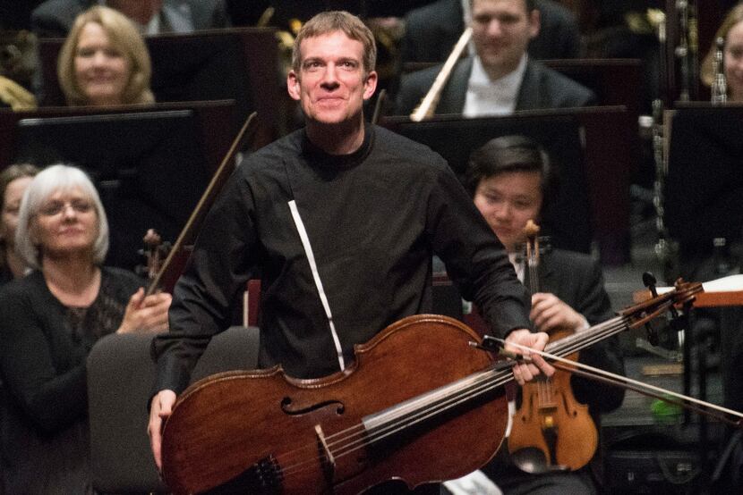 Cellist  Johannes Moser takes a bow during a standing ovation after performing the Dvorak...