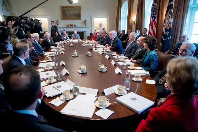 President Donald Trump speaks during a meeting with his Cabinet in the Cabinet Room of the...