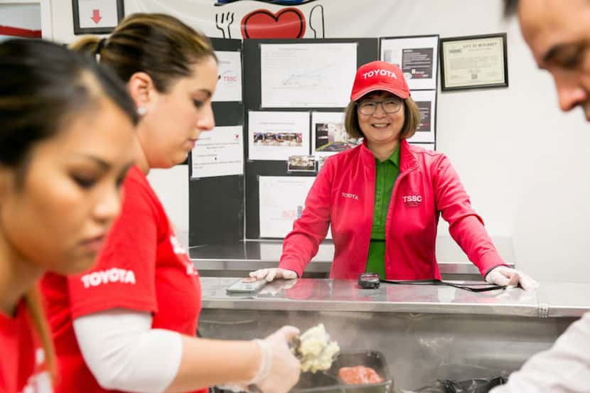 Toyota employees volunteer at a food bank