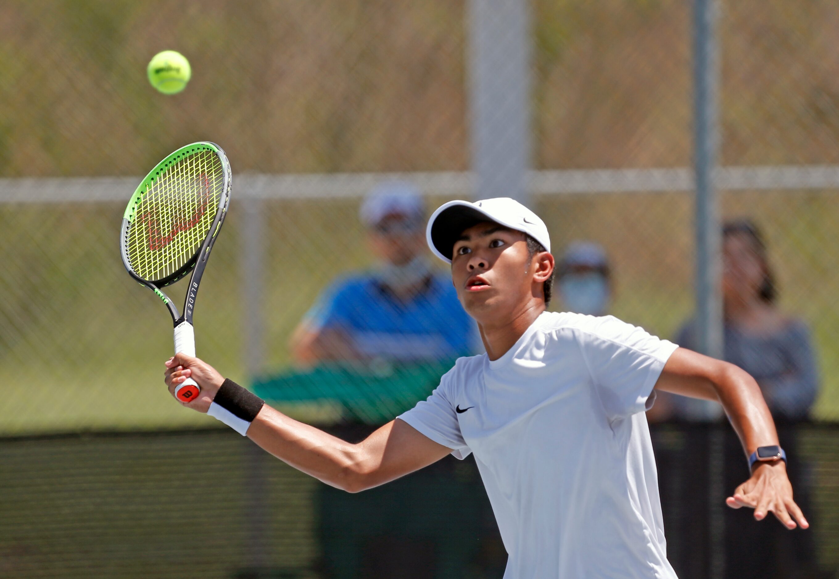 Frisco Heritage's Liam Selvido returns a point in a 5A boys doubles match. UIL state tennis...