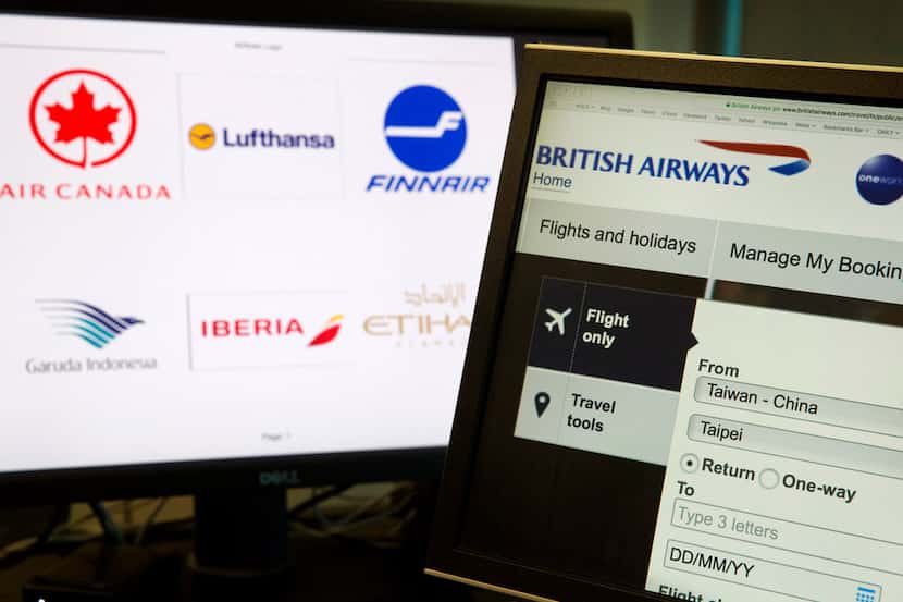 In this May 21, 2018, photo, a computer screens display the booking website of British...
