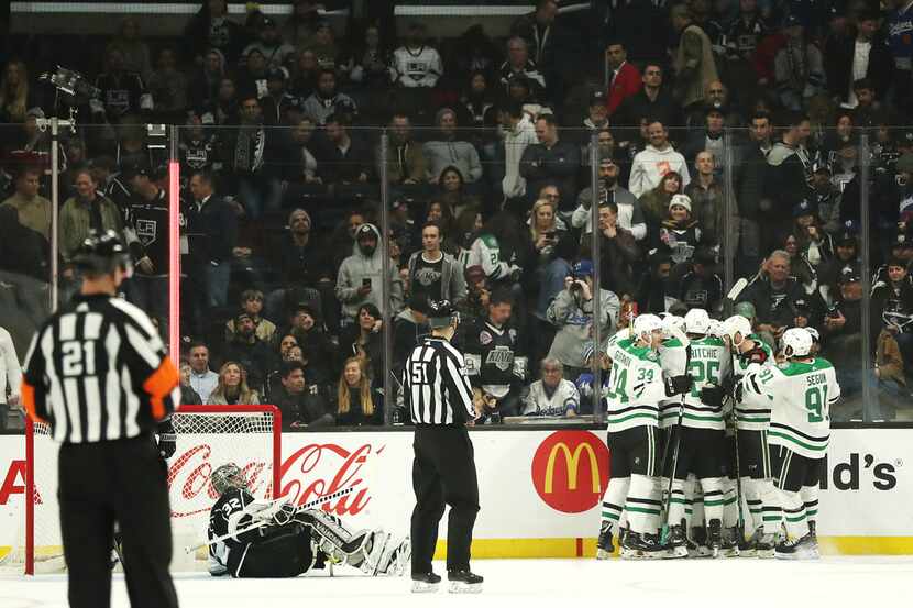 LOS ANGELES, CALIFORNIA - FEBRUARY 28: The Dallas Stars celebrate after the game-winning...