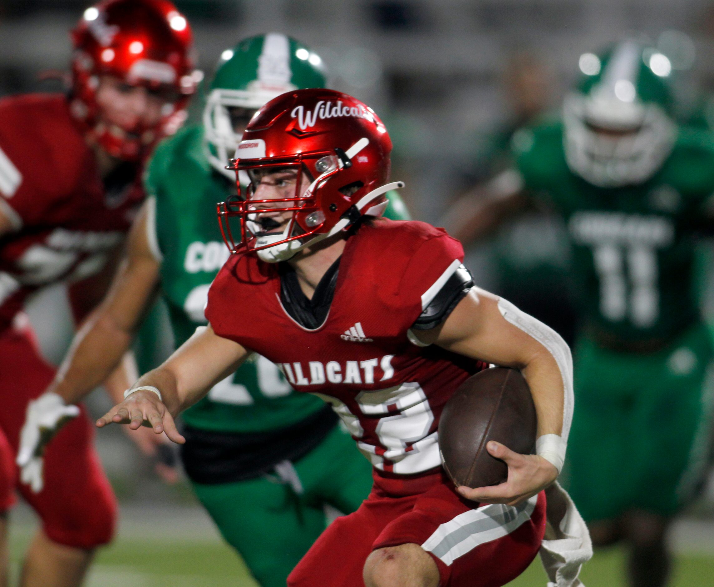 Dallas Woodrow Wilson running back Nathan Barrilleaux (22) looks for running room from the...