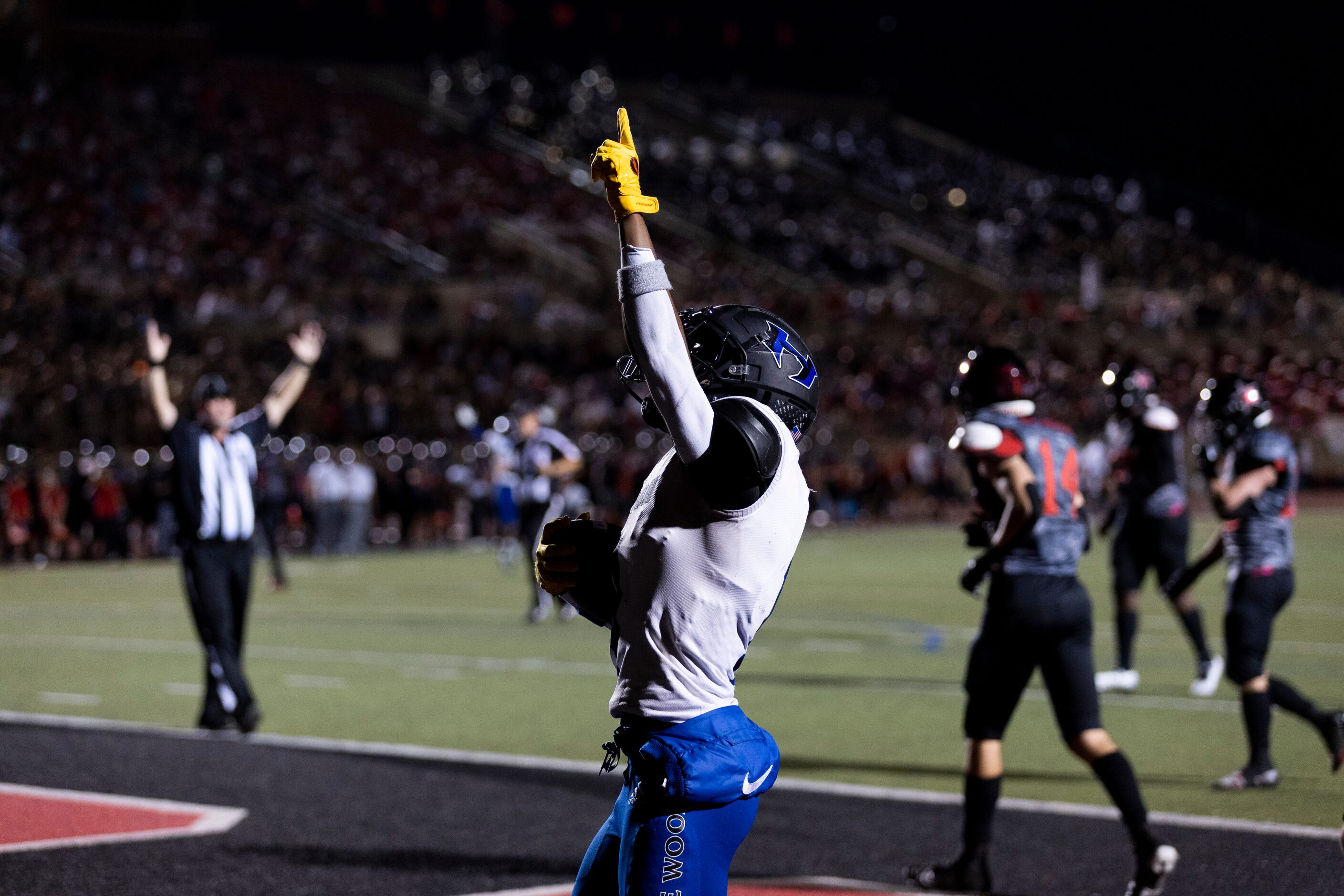 Hebron senior defensive back Trenton Bronaugh (1) celebrates scoring a touchdown during the...