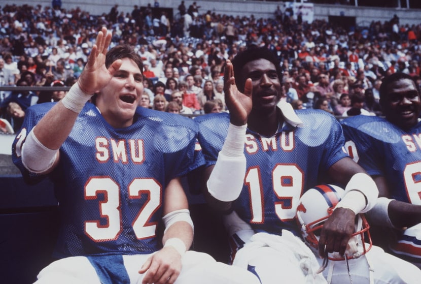 SMU football players Craig James ( left )  and Eric Dickerson