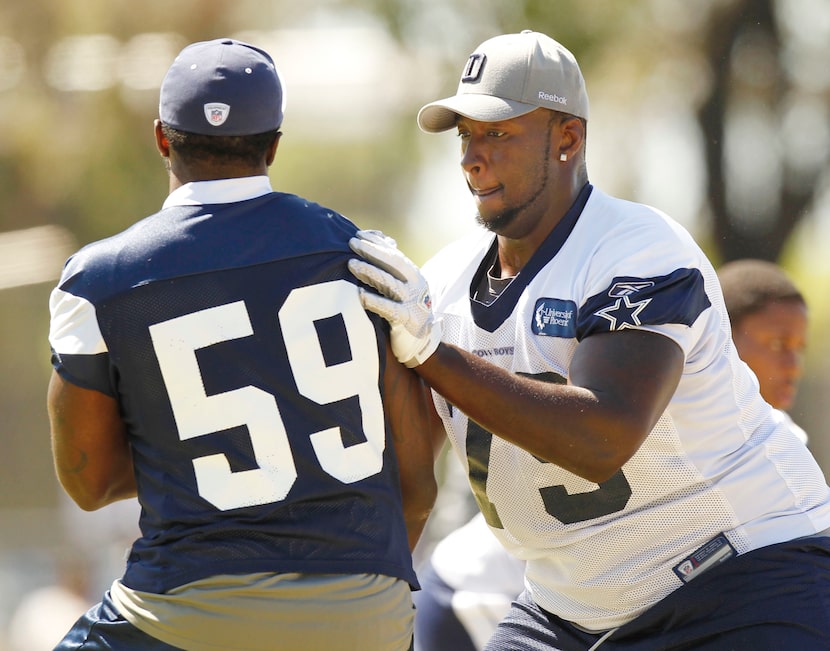 Dallas Cowboys offensive linemane Robert Brewster (79) blocks linebacker Brandon Williams...