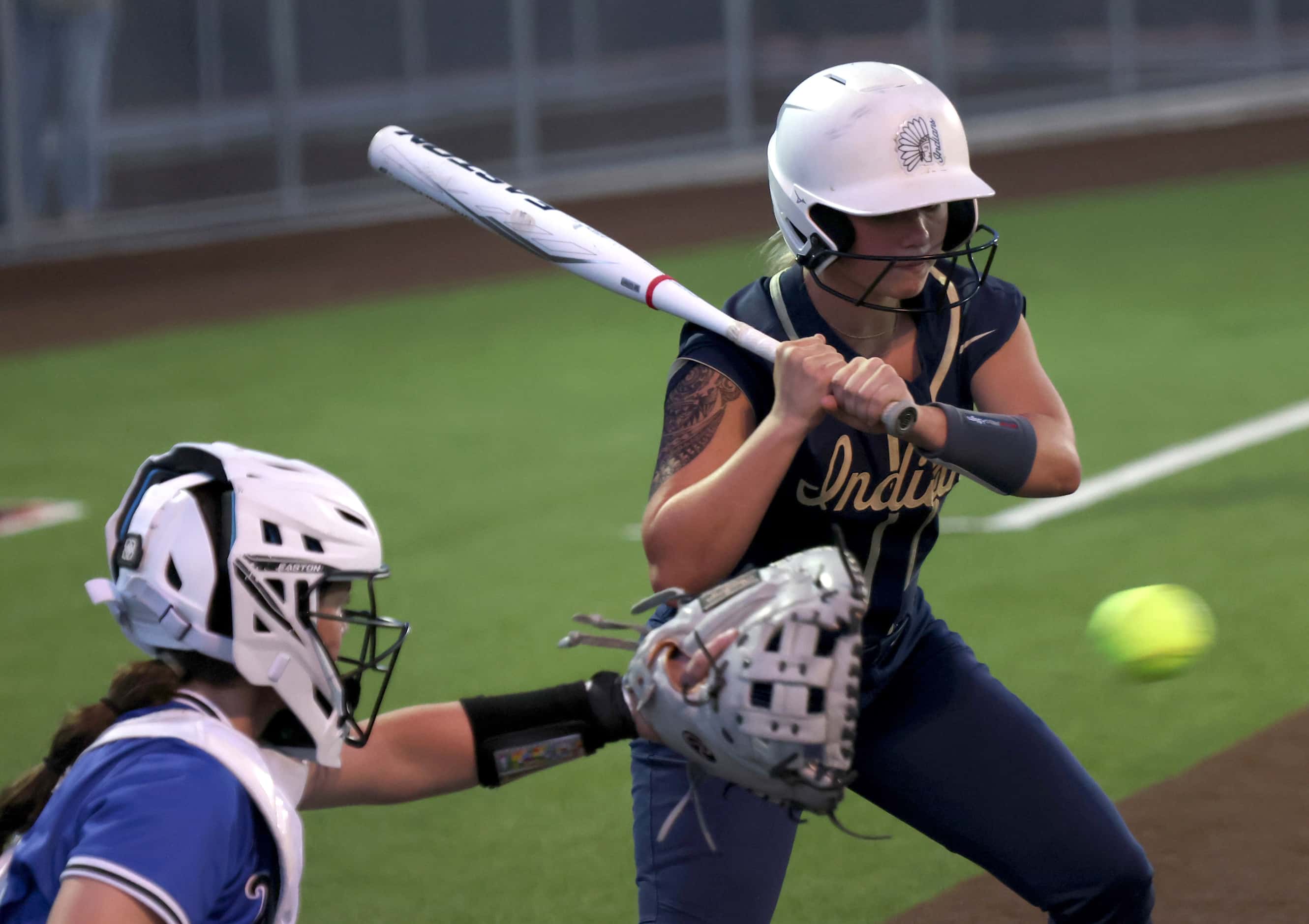 Keller's Mackenna Jackson (8) holds up on a pitch outside of the strike zone while batting...