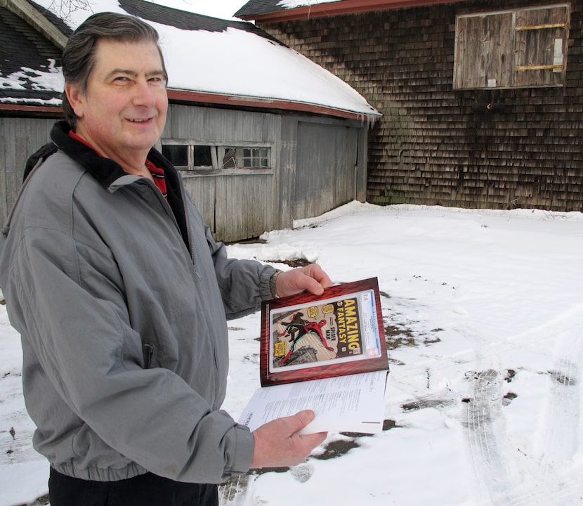 In this photo taken Tuesday, Feb. 9, 2016, in Calverton, N.Y., Walter Yacoboski holds an...