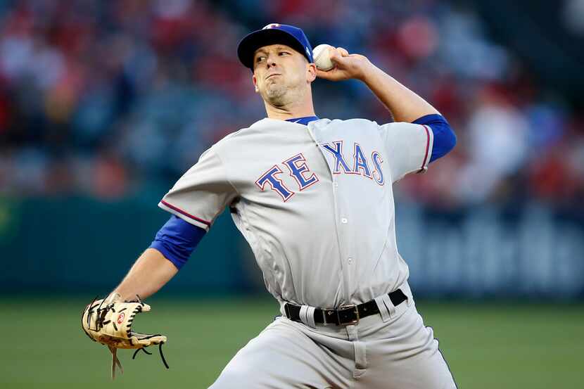 ANAHEIM, CALIFORNIA - MAY 24:  Drew Smyly #33 of the Texas Rangers pitches during the first...