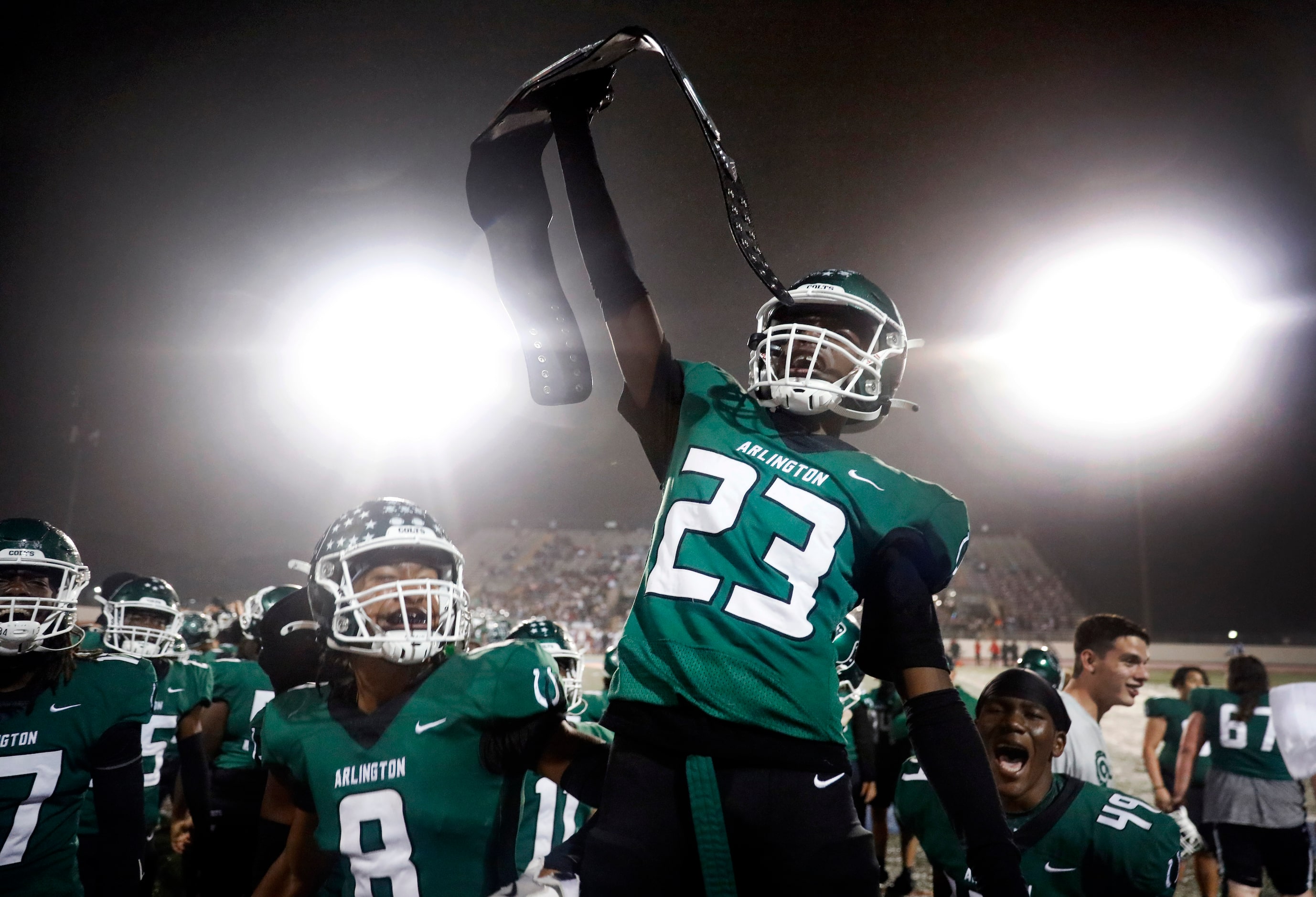 Arlington High defensive back Samajai Davis (23) celebrates his second half turnover of...