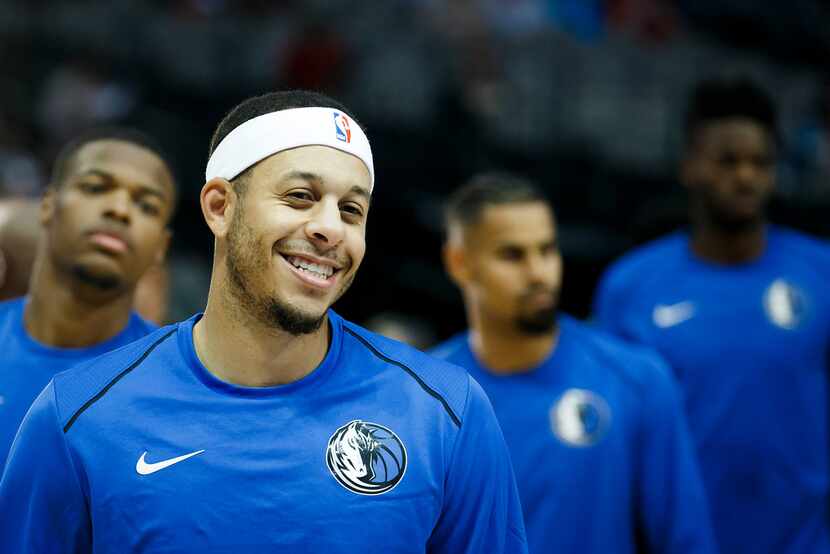 FILE - Dallas Mavericks guard Seth Curry smiles during pregame warmup before an NBA...