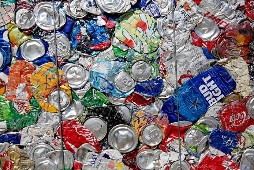 Aluminum cans are baled at the Dallas recycling center.