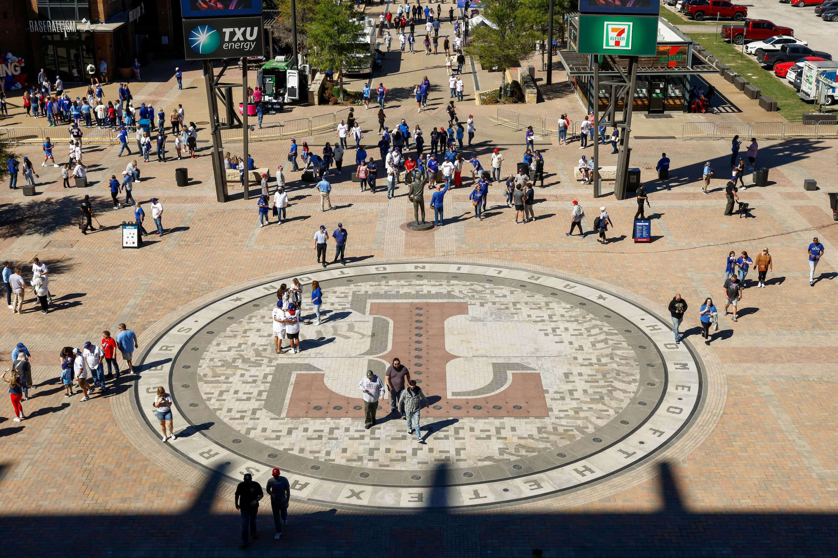 Baseball fans  gather outside Texas Live as they make their way to Globe Life Field for the...