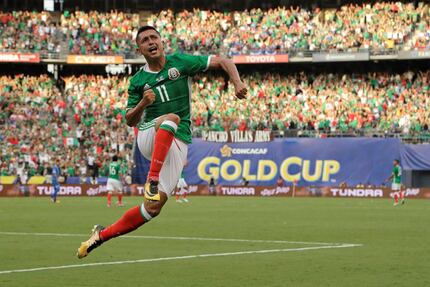 Mexico's Elias Hernandez celebrates after scoring a goal against El Salvador during a...