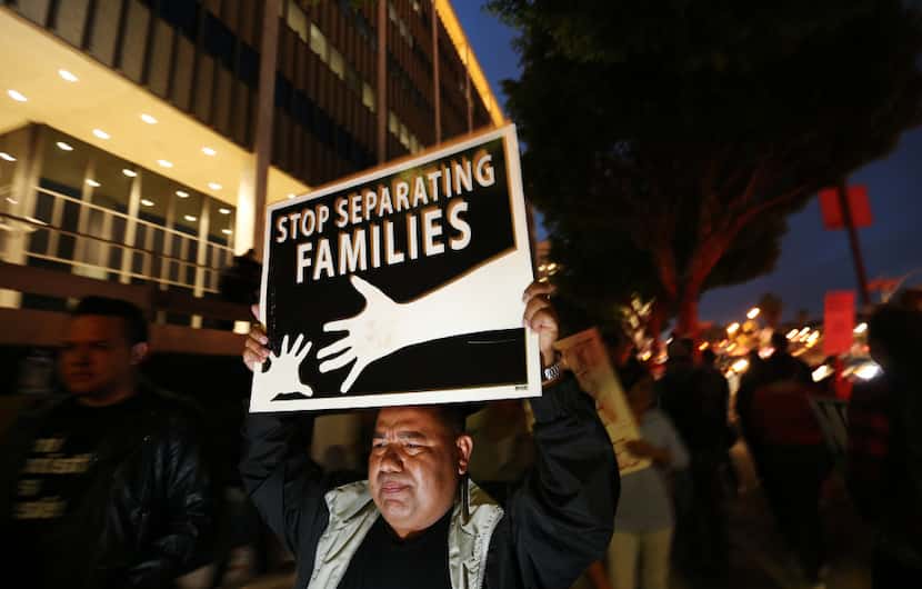 In Los Angeles on Thursday, dozens of families rallied against deportations by ICE agents in...